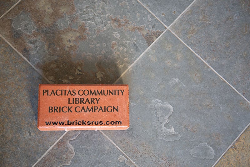 Brick inscribed "Placitas Community Library Brick Campaign"
